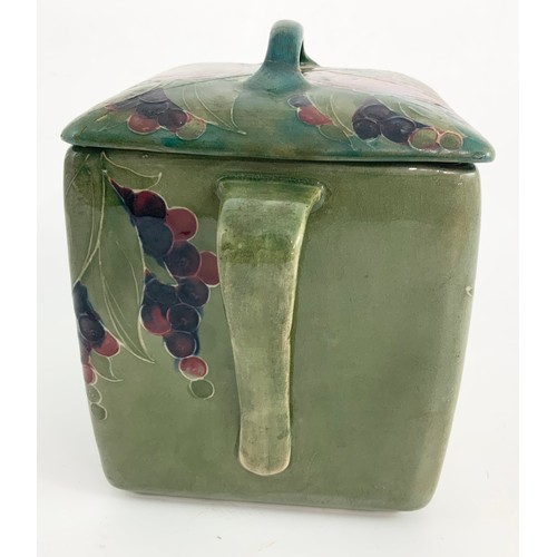 45 - MOORCROFT SQUARE SECTION TWO HANDLED BISCUIT BARREL, A POMEGRANATE PATTERN, POSSIBLY FOR LIBERTY AND... 