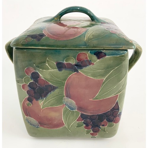 45 - MOORCROFT SQUARE SECTION TWO HANDLED BISCUIT BARREL, A POMEGRANATE PATTERN, POSSIBLY FOR LIBERTY AND... 