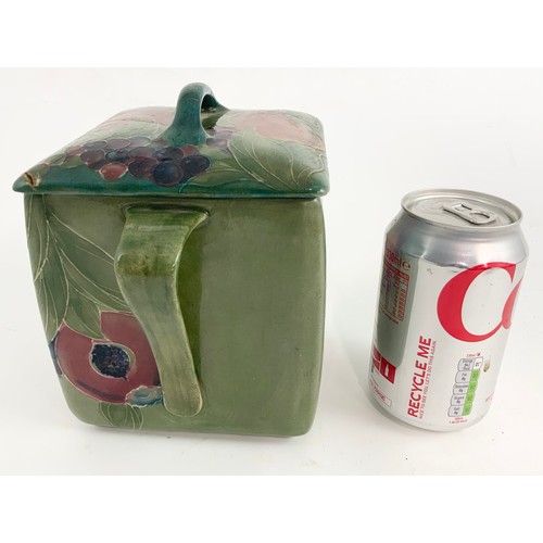 45 - MOORCROFT SQUARE SECTION TWO HANDLED BISCUIT BARREL, A POMEGRANATE PATTERN, POSSIBLY FOR LIBERTY AND... 