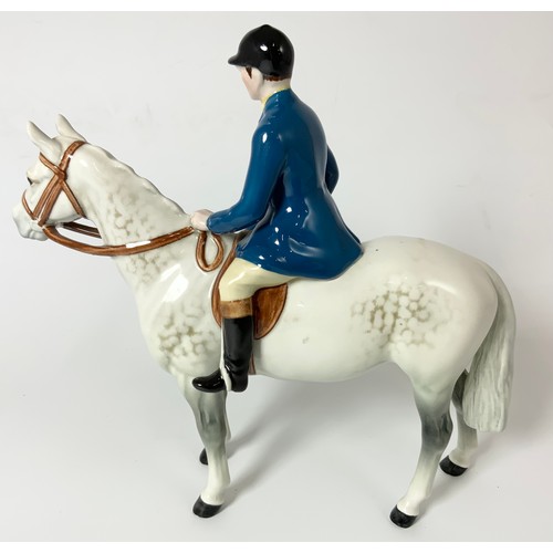 96 - RARE BESWICK HUNTSMAN WEARING BLUE JACKET ON GREY HORSE MODEL NO 1501 21cm  TALL
Please note, we bel... 