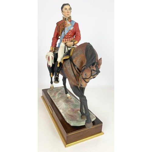 91 - ROYAL WORCESTER MODEL OF WELLINGTON MODELLED BY BERNARD WINSKILL ON WOODEN PLINTH