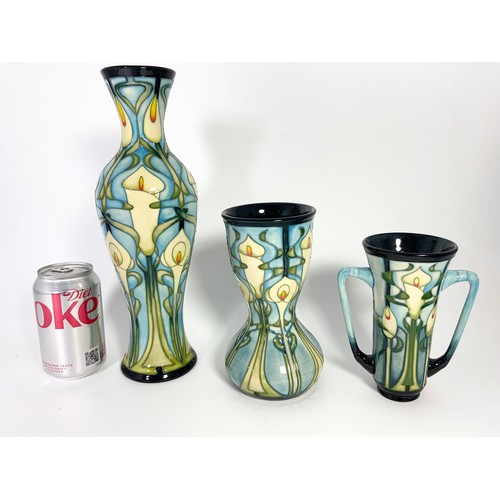 56 - 6 'CALLA LILLY' MOORCROFT PIECES INCLUDING 4 VASES, LIDDED POT AND TRAY