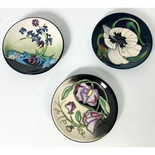 57 - A COLLECTION OF 9 MOORCROFT PIN TRAYS DESIGNS INCLUDED ARE ANEMONE TRIBUTE/MEMORY LANE/TRIPLE CHOICE... 