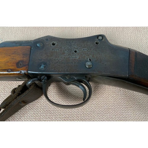 232 - A LATE 19TH CENTURY MARTINI HENRY RIFLE, THE LOCK STAMPED 'VR' SURMOUNTED BY A CROWN STAMPED ENFIELD... 