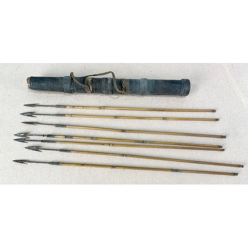 203 - 2, POSSIBLY AFRICAN, STEEL TIPPED SPEARS TOGETHER WITH A HIDE QUIVER OF STEEL TIPPED BAMBOO ARROWS