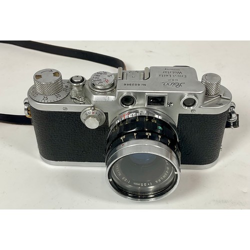 295 - A LEITZ WETZLAR LEICA IIIF RANGEFINDER CAMERA NO. 602966 WITH CASE AND ACCESSORIES