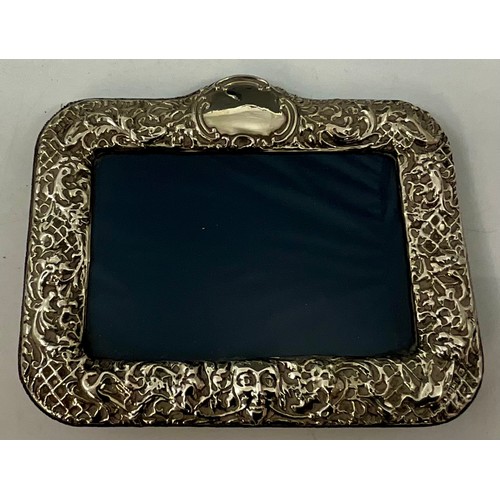 410 - PAIR OF EMBOSSED SILVER PHOTO FRAMES AN ARTHUR PRICE PHOTO FRAME AND A MINIATURE EMBOSSED PHOTO FRAM... 