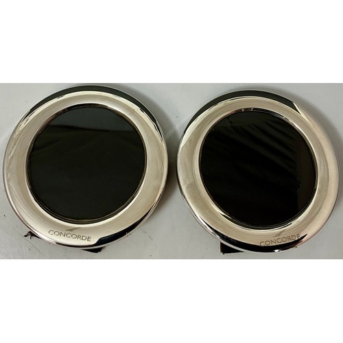 411 - PAIR OF CONCORDE ROUND SILVER PHOTO FRAMES