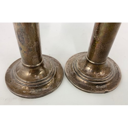 409 - PAIR OF SILVER CANDLESTICKS 14cm TALL