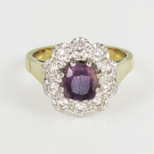 888 - 18CT GOLD AMETHYST AND DIAMOND CLUSTER RING, CENTRAL AMETHYST SET WITHIN A RING OF 10 BRILLIANT CUT ... 