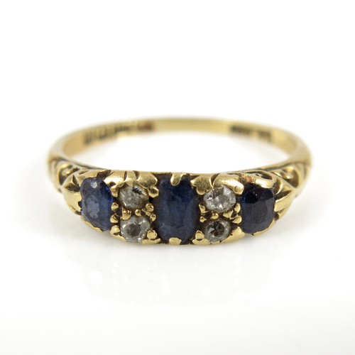 884 - 18ct GOLD SAPPHIRE AND DIAMOND RING