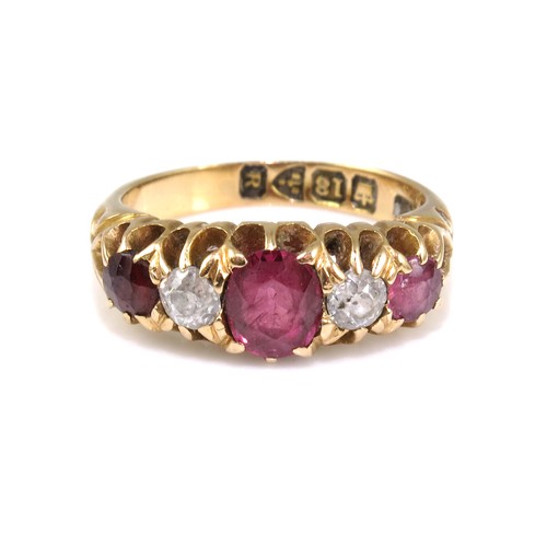 890 - 18ct GOLD VICTORIAN RUBY AND DIAMOND RING ON SET WITH 3 RUBIES AND 2 DIAMONDS APPROX. 5g gross