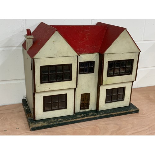 52 - 1950'S DOLLS HOUSE WITH  A SELECTION OF FURNITURE