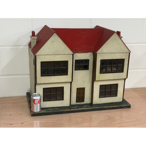 52 - 1950'S DOLLS HOUSE WITH  A SELECTION OF FURNITURE