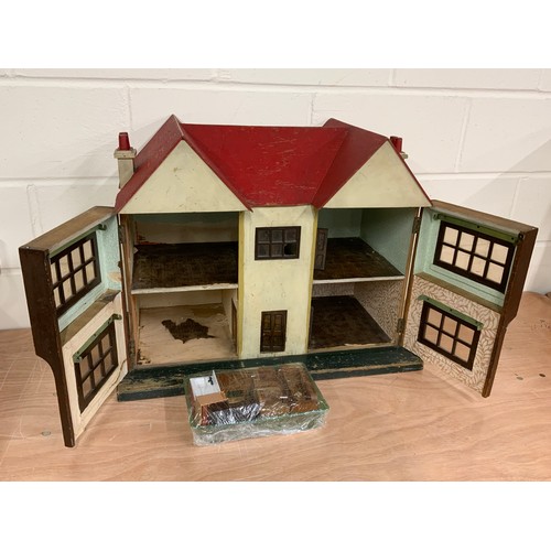 52 - 1950'S DOLLS HOUSE WITH  A SELECTION OF FURNITURE