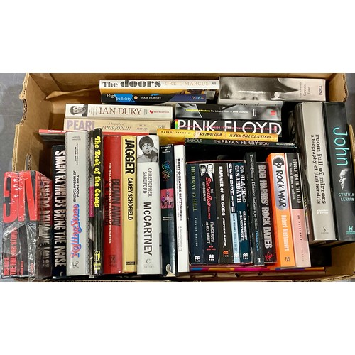 704 - QTY. MISC. MOSTLY ROCK AND POP RELATED BOOKS (2 BOXES)