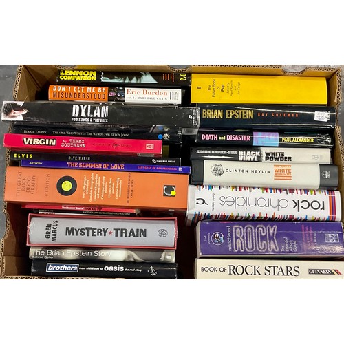 704 - QTY. MISC. MOSTLY ROCK AND POP RELATED BOOKS (2 BOXES)