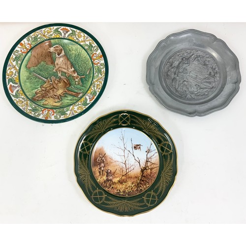 64 - WEDGEWOOD HUNTING DOG PLATE, ONE OTHER AND TWO DOG PRINTS