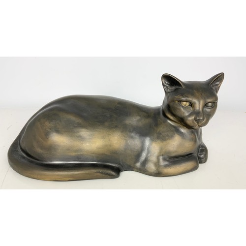 135 - BLACK CERAMIC STUDY OF A RECLINING CAT HARVEY SIGNED P A BOOTLE