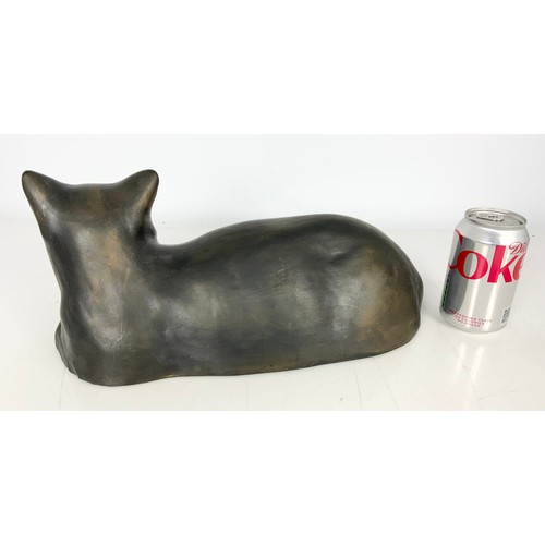 135 - BLACK CERAMIC STUDY OF A RECLINING CAT HARVEY SIGNED P A BOOTLE