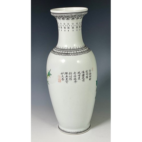 183 - ORIENTAL PORCELAIN BALUSTER VASE DECORATED WITH EXOTIC BIRDS AND SCRIPT, APPROX. 22cm