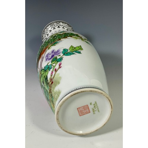 183 - ORIENTAL PORCELAIN BALUSTER VASE DECORATED WITH EXOTIC BIRDS AND SCRIPT, APPROX. 22cm