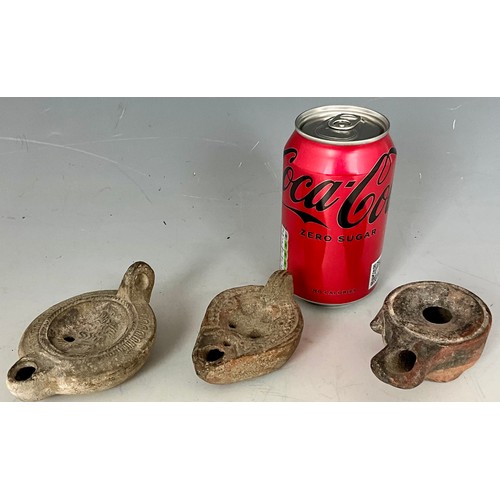 201 - THREE TERRACOTTA ROMAN OIL LAMPS