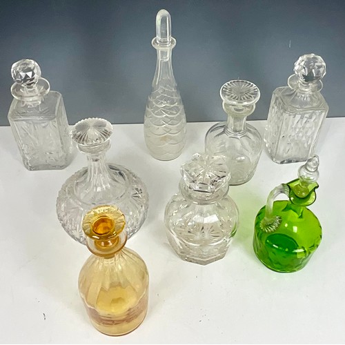 229 - COLLECTION OF DECANTERS INCLUDING CLEAR CRYSTAL/VICTORIAN GREEN AND CLEAR AND VINTAGE YELLOW GLASS D... 