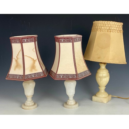 267 - A SMALL PAIR AND ONE OTHER ALABASTER LAMPS