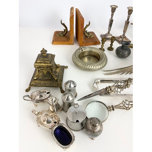 297 - BOX OF SILVER PLATED WARE, BRASS CANDLESTICK, DOLPHIN BOOKENDS ETC.