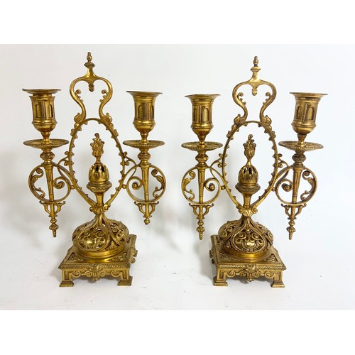 306 - PAIR OF PIERCED GILT BRASS CANDLESTICKS