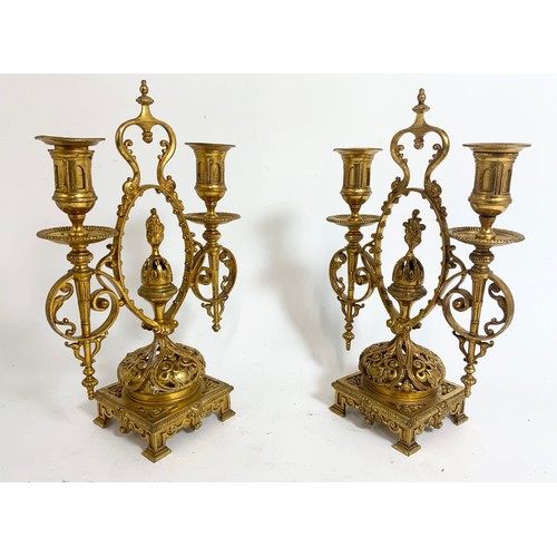 306 - PAIR OF PIERCED GILT BRASS CANDLESTICKS