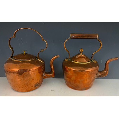 320 - TWO COPPER KETTLES AND A COAL HELMET