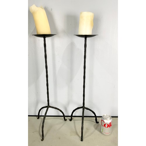 323 - TWO PAIRS OF WROUGHT IRON TABLE CANDLESTICKS