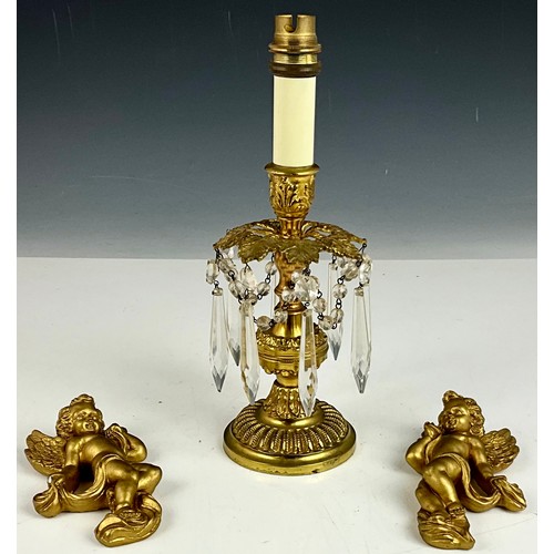 350 - A GILT LUSTRE LAMP BASE T/W A PAIR OF GILT CHERUB WALL HANGINGS