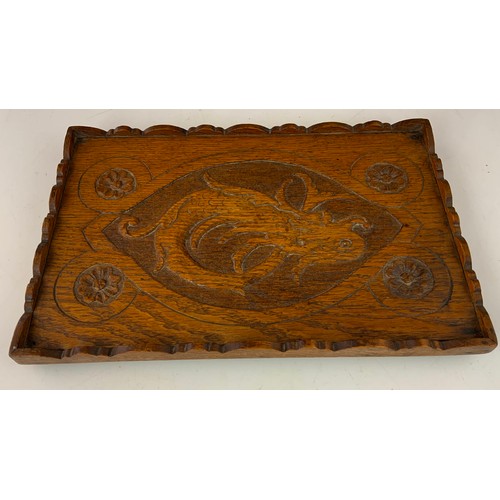 359 - TWO OAK TRAYS TOGETHER WITH A CARVED OAK TRAY