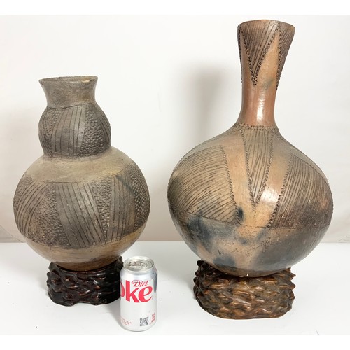 376 - 2 AFRICAN GOURD VASES WITH INCISED DECORATION WITH HARDWOOD STANDS