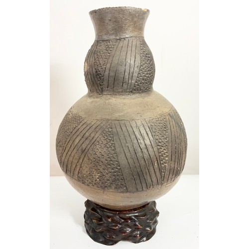 376 - 2 AFRICAN GOURD VASES WITH INCISED DECORATION WITH HARDWOOD STANDS