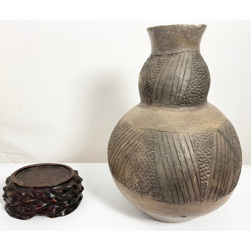 376 - 2 AFRICAN GOURD VASES WITH INCISED DECORATION WITH HARDWOOD STANDS