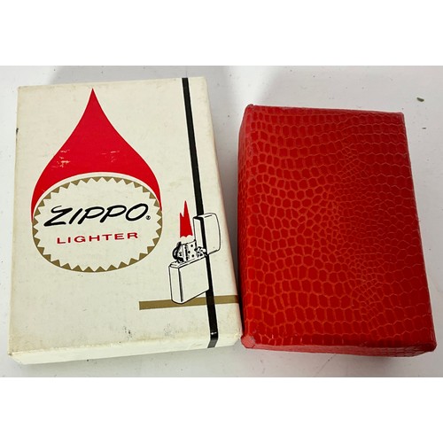 353 - 2 BOXED ZIPPO LIGHTERS