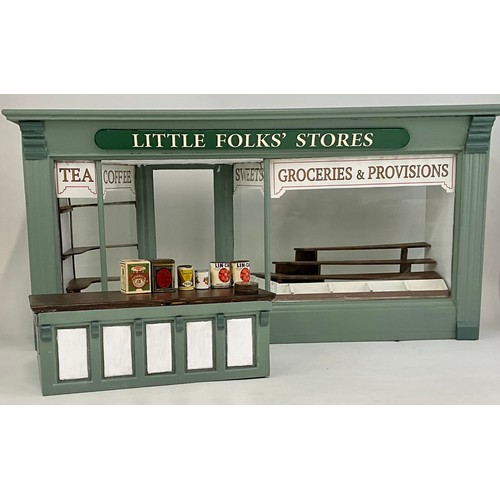 49 - LITTLE FOLKS STORES, A C.1910 STYLE MODEL SHOP FRONT AND COUNTER TOGETHER WITH ACCESSORIES INC VINTA... 