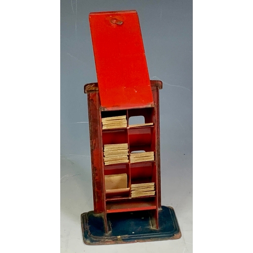 186 - A BING TIN PLATE MADE IN GERMANY TOY TICKET BOOKING OFFICE WITH SELECTION OF TICKETS, 19CM TALL, SOM... 