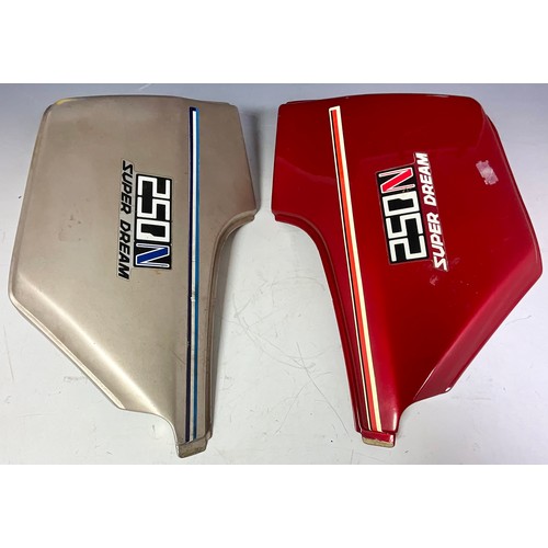 14 - TWO MOTORCYCLE PANELS FOR A HONDA 250N SUPER DREAM. ONE RED ONE SILVER