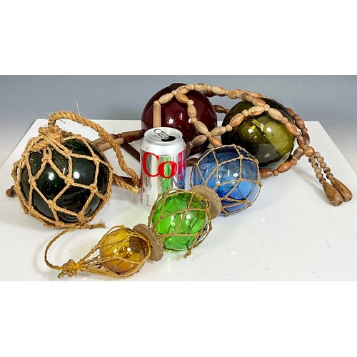 224 - VINTAGE COLOURED GLASS FLOATS WITH HANGING NETS