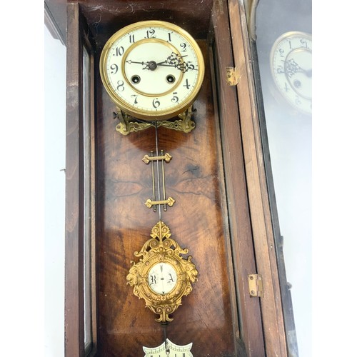 249 - WALL CLOCK WITH PENDULUM AND KEY.