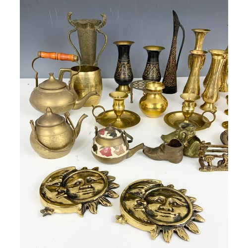 300 - A COLLECTION OF BRASSWARE INCLUDING CANDLEHOLDERS, VASES, SHOES