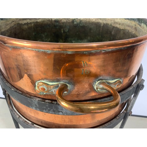 293 - COPPER PLANTER ON WROUGHT IRON STAND 63cm TALL