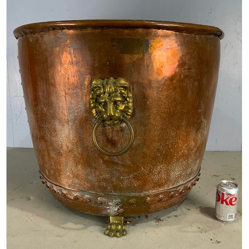 292 - LARGE  COPPER STUDDED LOG BIN WITH 2 LION MASK HANDLES ON 3 CLAW FEET 57cm TALL, 75cm IN DIAMETER