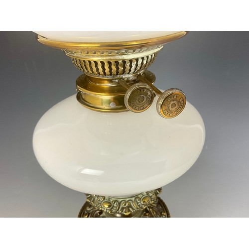 274 - VICTORIAN OIL LAMP WITH RELIEF DECORATED BRASS BASE, OPALESCENT GLASS RESERVOIR AND SHADE, APPROX. 5... 