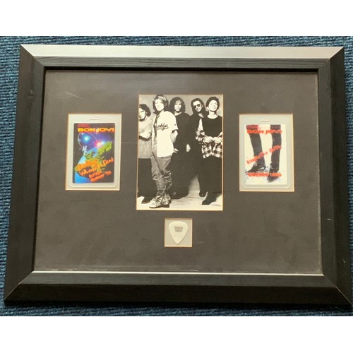 89 - 5 ROCK MEMORABILIA PICTURES FRAMED WITH TOUR PASSES AND NUMBERED PLECTRUMS
ELTON JOHN STOCKHOLM 1992... 